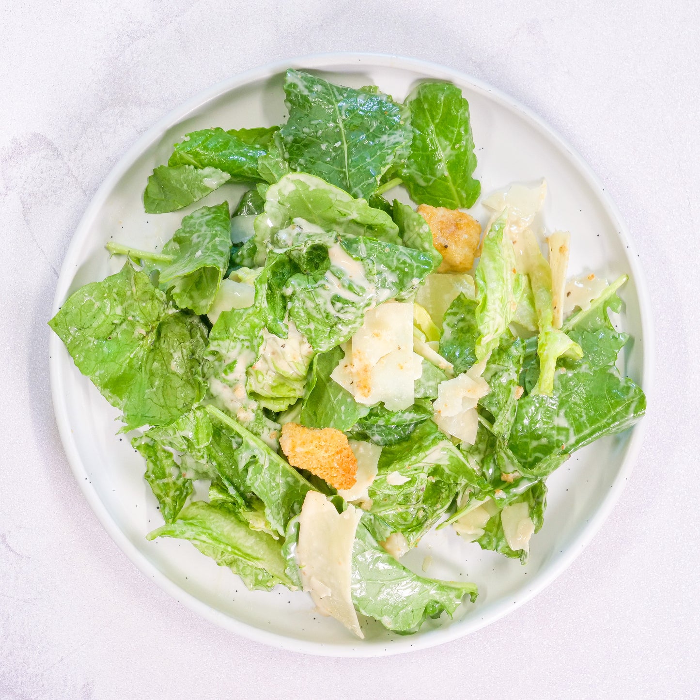 Baby Kale and Romaine Caesar Salad with Croutons