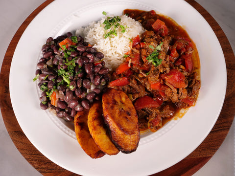 Ropa Vieja (Braised Beef, Peppers, and Onions) with Rice, Beans, and Fried Plantain